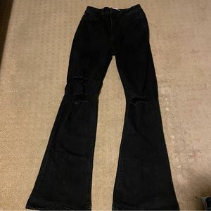Woman’s Teen black ripped flare jeans